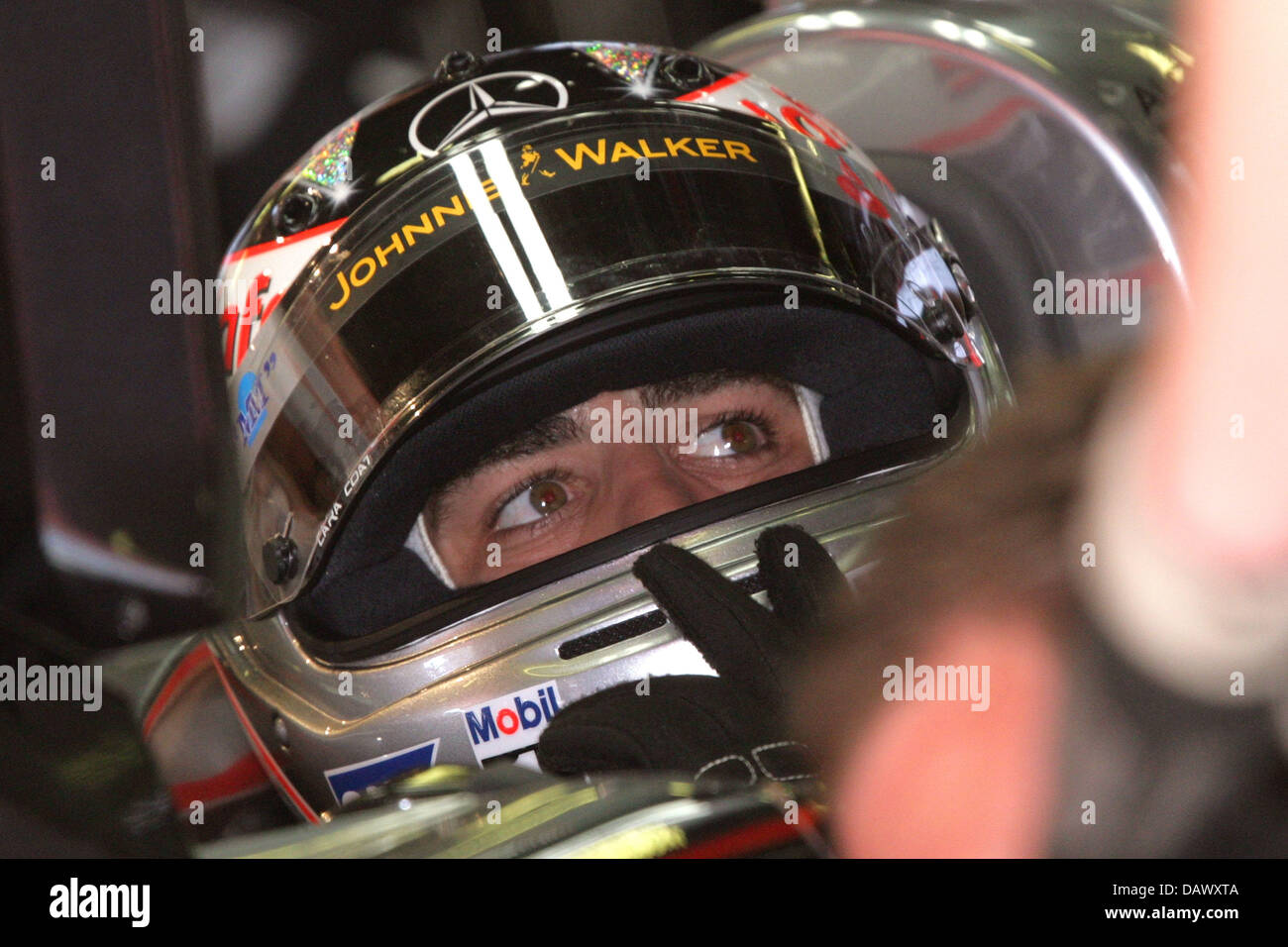 Spanish Formula One pilot Fernando Alonso of McLaren Mercedes sits in his car during the third practice session at the Circuit de Catalunya race track near Barcelona, Spain, 12 May 2007. The 2007 Formula 1 Grand Prix of Spain takes place on 13 May. Photo: Jens Buettner Stock Photo