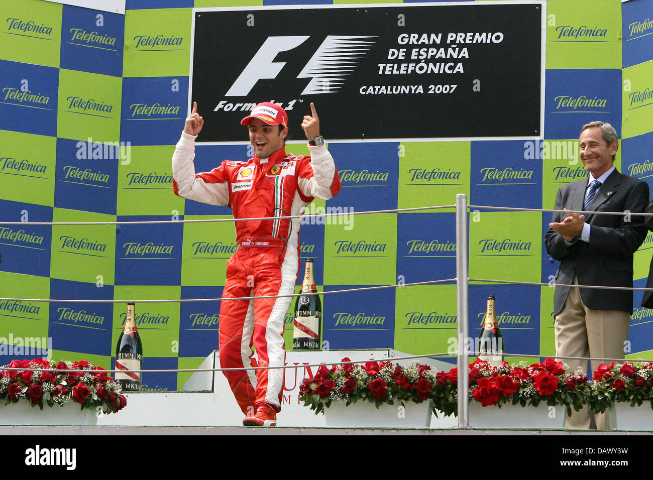 Brazilian Formula One pilot Felipe Massa of Ferrari celebrates his victory on the podium after the Spanish Grand Prix at Circuit de Catalunya race track in Montmelo near Barcelona, Spain, Sunday, 13 May 2007. Photo: JENS BUETTNER Stock Photo