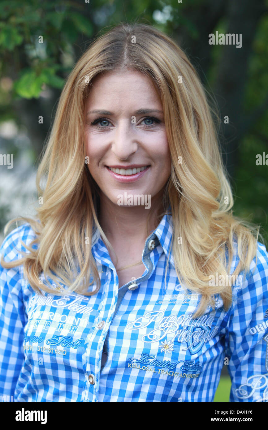 German Schlager singer Stefanie Hertel poses at the artists meeting prior to ORF TV show 'Wenn die Musi spielt' ('When the music plays') in Bad Kleinkirchheim, Austria, 19 July 2013. The Summer Open Air 2013 is broadcasted by German TV channel MDR on 20 July 2013, 20.15. Photo: BODO SCHACKOW Stock Photo