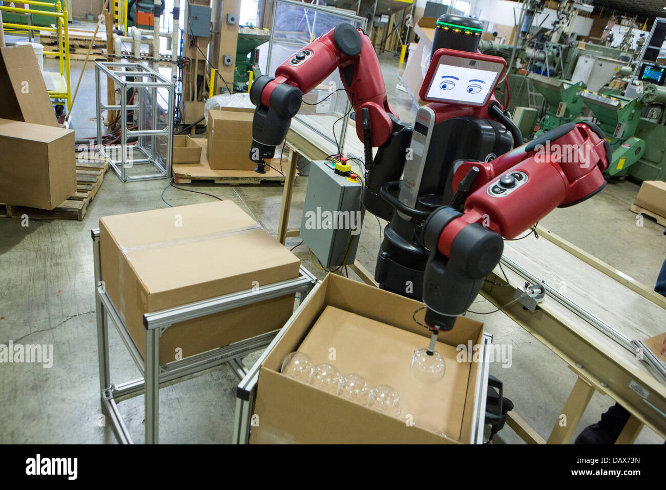 Baxter the robot made by Rethink Robotics at the Rodon Group plastic molding factory.  Stock Photo