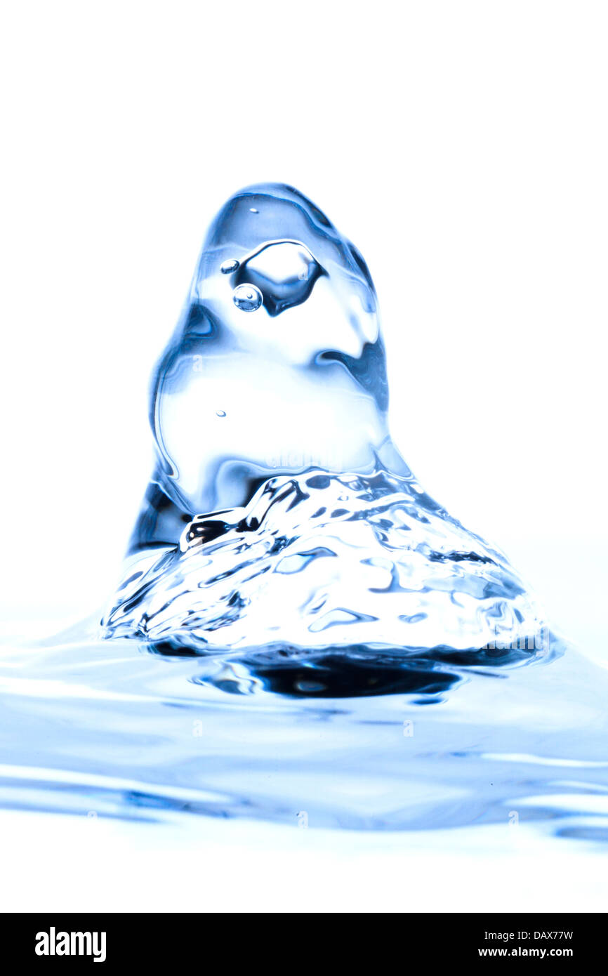 Water Drop Impact On The Liquid Surface White Background Stock Photo