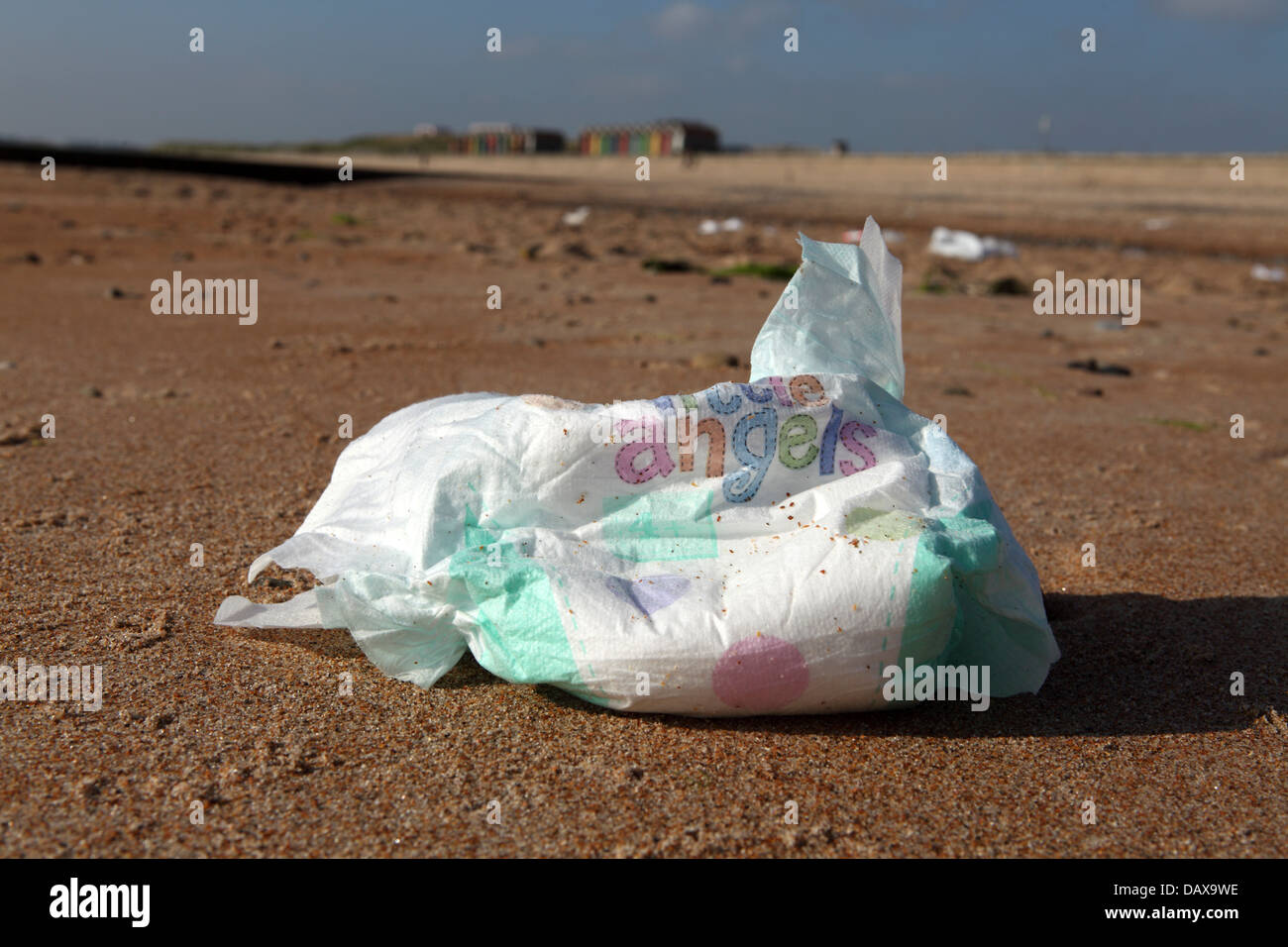 A nappy is among rubbish strewn on the beach at Blyth in Northumberland, England. Stock Photo