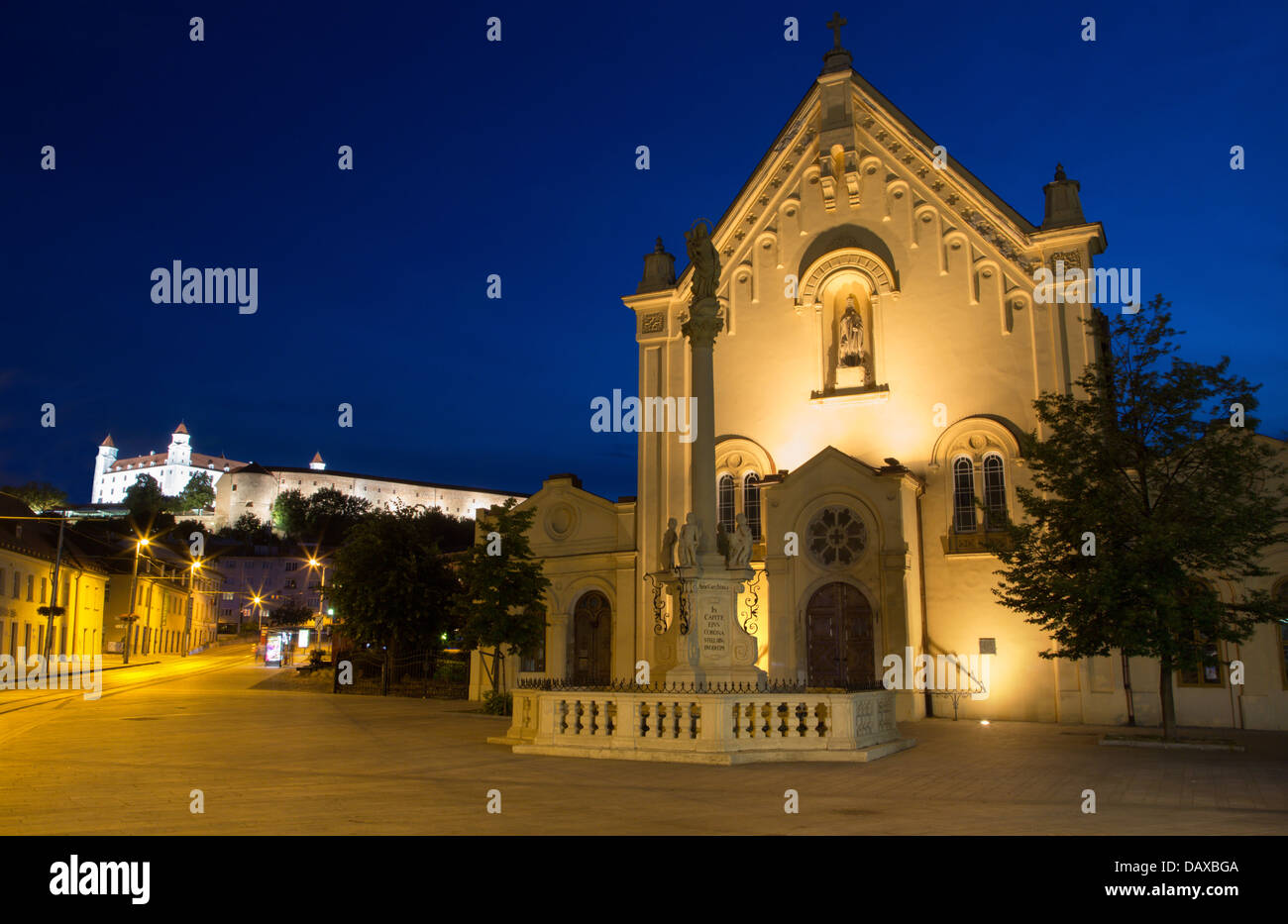 Bratislava - capuchin s church and castle at dusk Stock Photo