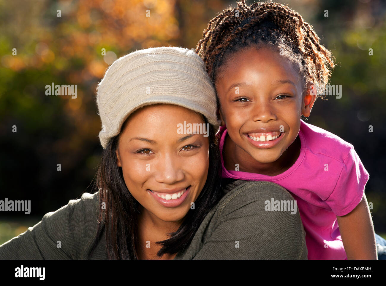 African American mother and child having fun spending time together in a park Stock Photo