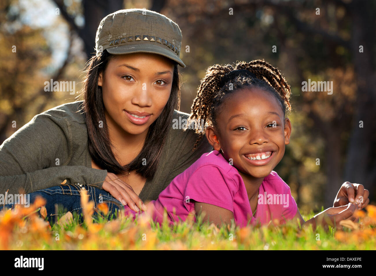 African American mother and child having fun spending time together in a park Stock Photo