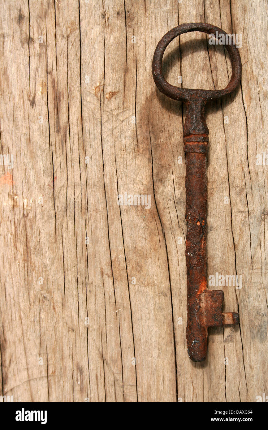 A rust covered skeleton key on a board in Cotacachi, Ecuador Stock Photo