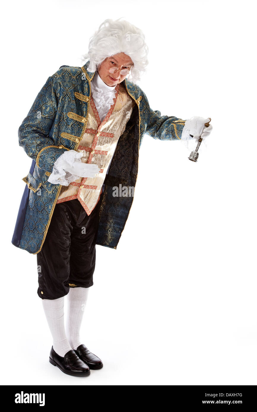 Lackey Example Lackey in victorian livery costume ringing a bell for a message Stock ...