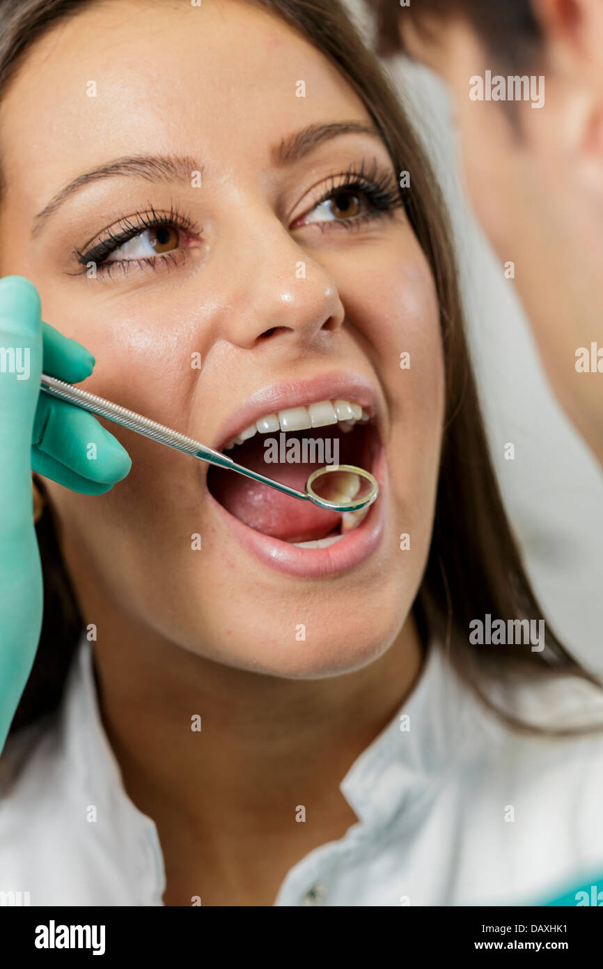 Young woman at the dentist Stock Photo Alamy
