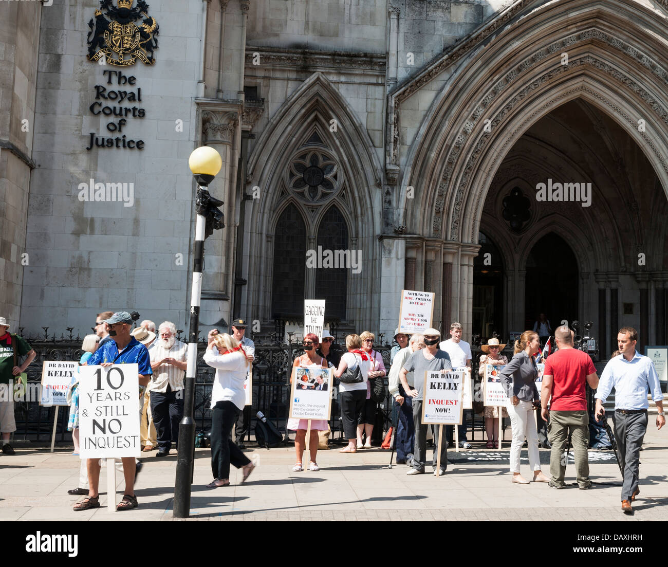 Group of supporters rally for justice for Dr David Kelly on tenth anniversary of his death outside Royal Courts of Justice, UK Stock Photo