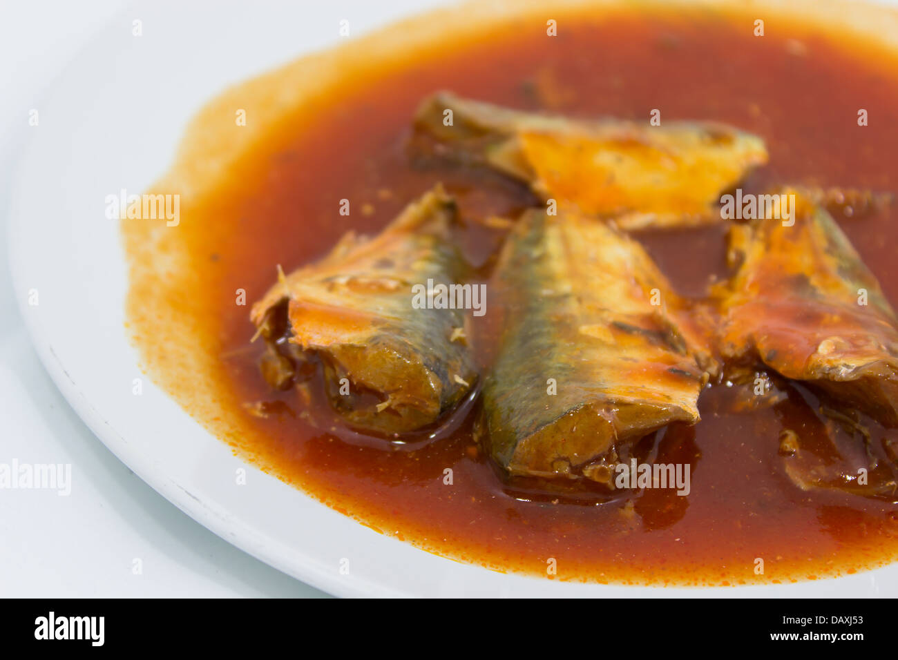 canned mackerel in dish Stock Photo Alamy