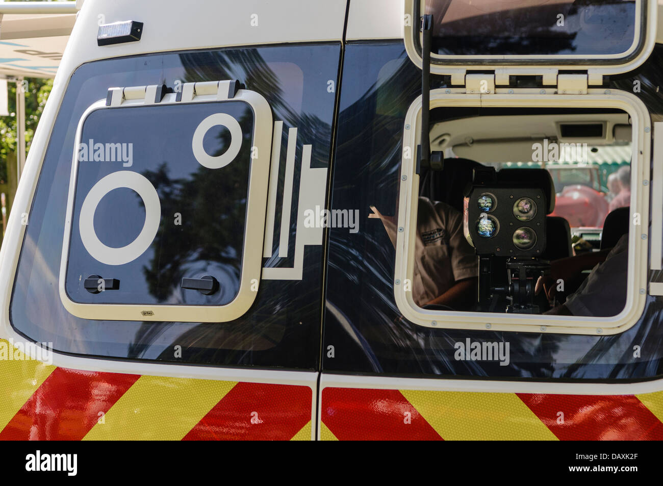 Camera looks out of the rear of a Police speed detection van Stock Photo