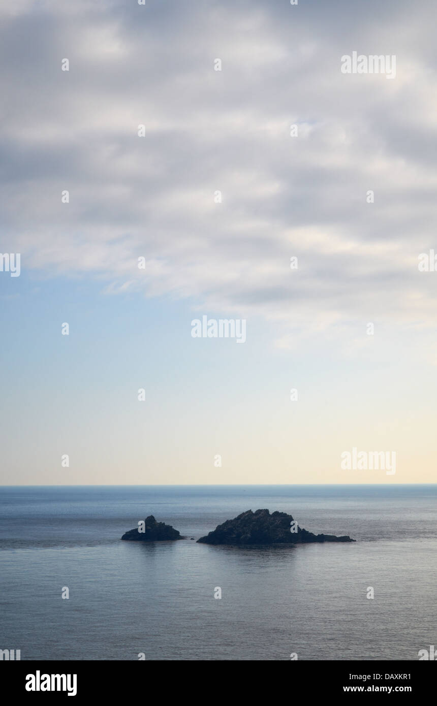 The Brisons off the coast at Cape Cornwall, England, UK Stock Photo