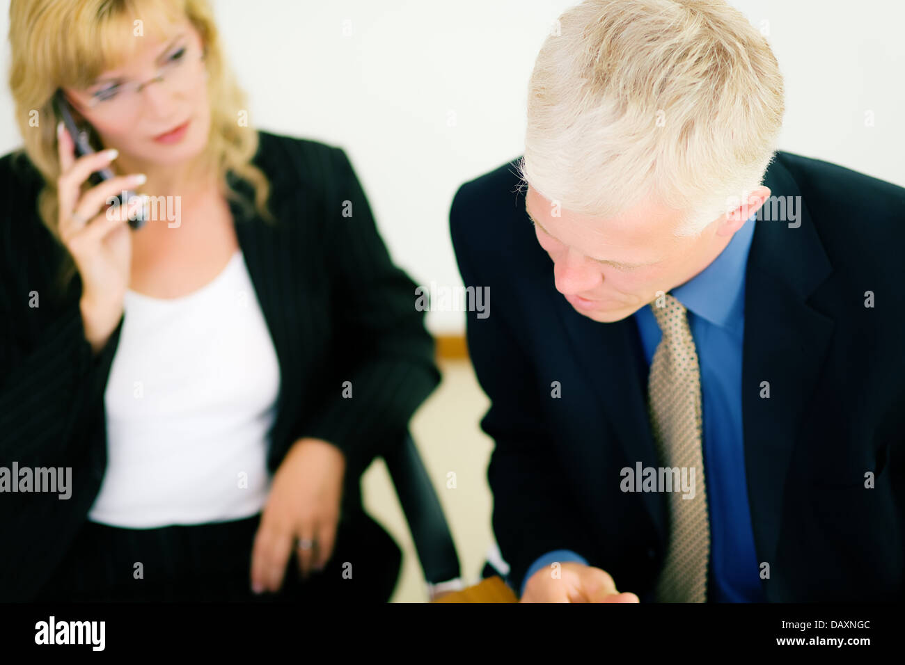 Man woman office suit hi-res stock photography and images - Alamy