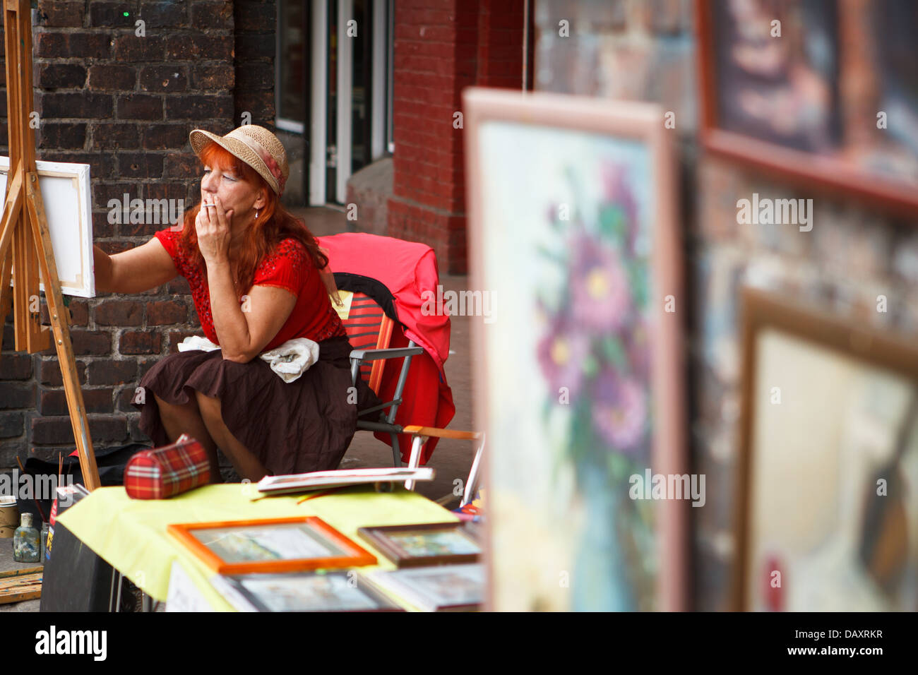 Artist painting on canvas. Katowice, Poland Stock Photo Alamy