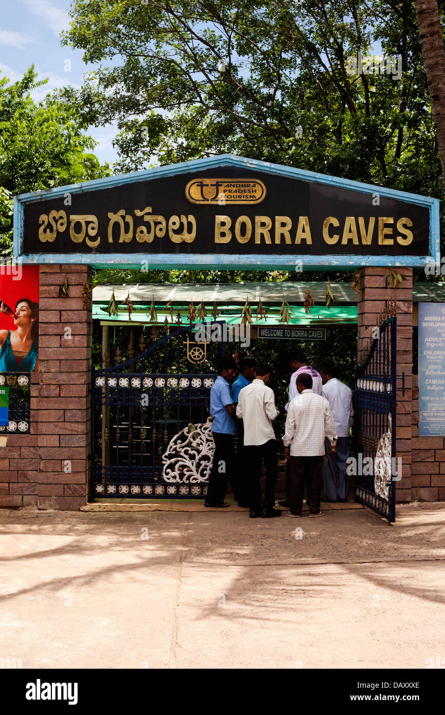 Tourists at the entrance of a c…