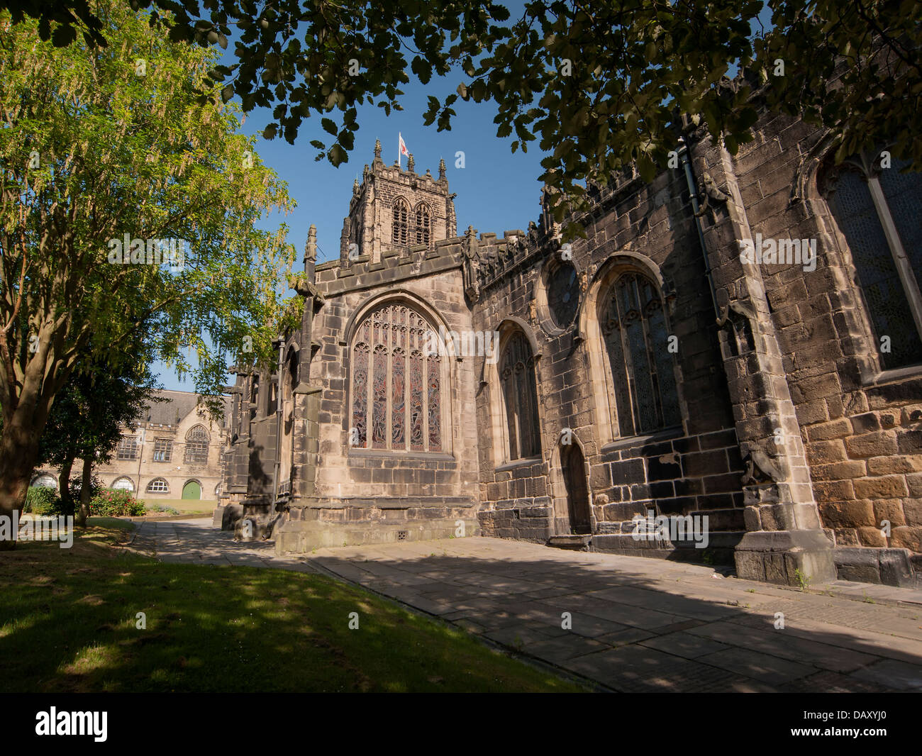 South facade of Halifax Minster showing stained glass window Stock Photo Alamy