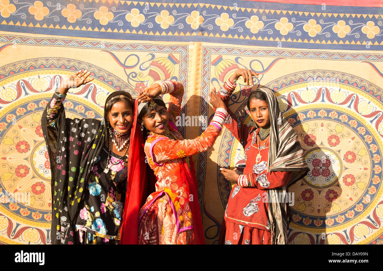 Three women posing in traditional Rajasthani dress, Pushkar, Ajmer, Rajasthan, India Stock Photo