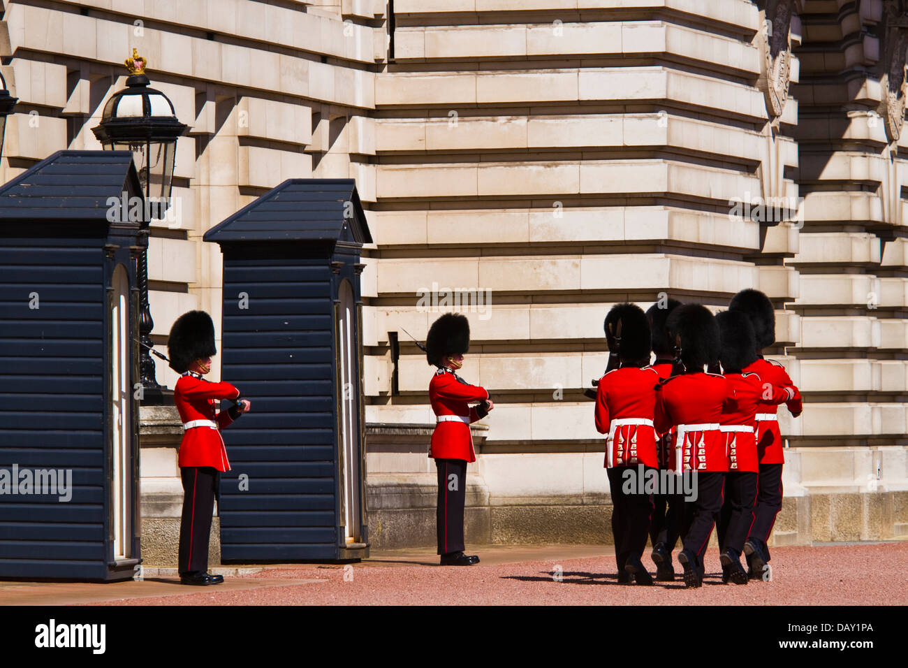 Changing of the guard ceremony held inside the grounds of Buckingham palace, London Stock Photo