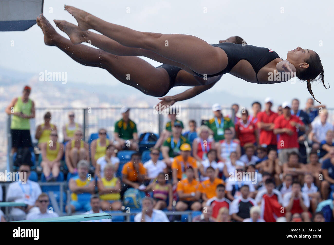 Barcelona, Spain. 20th July, 2013. Jennifer Abel and Pamela Ware of Canada in action during the women's 3m Synchro Springboard diving final of the 15th FINA Swimming World Championships at Montjuic Municipal Pool in Barcelona, Spain, 20 July 2013. Foto: David Ebener/dpa /dpa/Alamy Live News Stock Photo