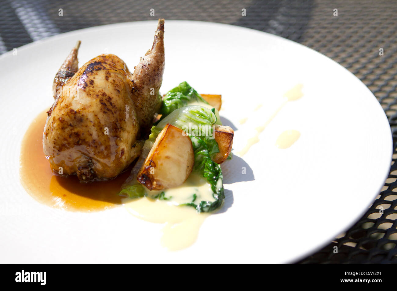 Whole quail main course at The Hand & Flowers pub and restaurant, Marlow. Stock Photo