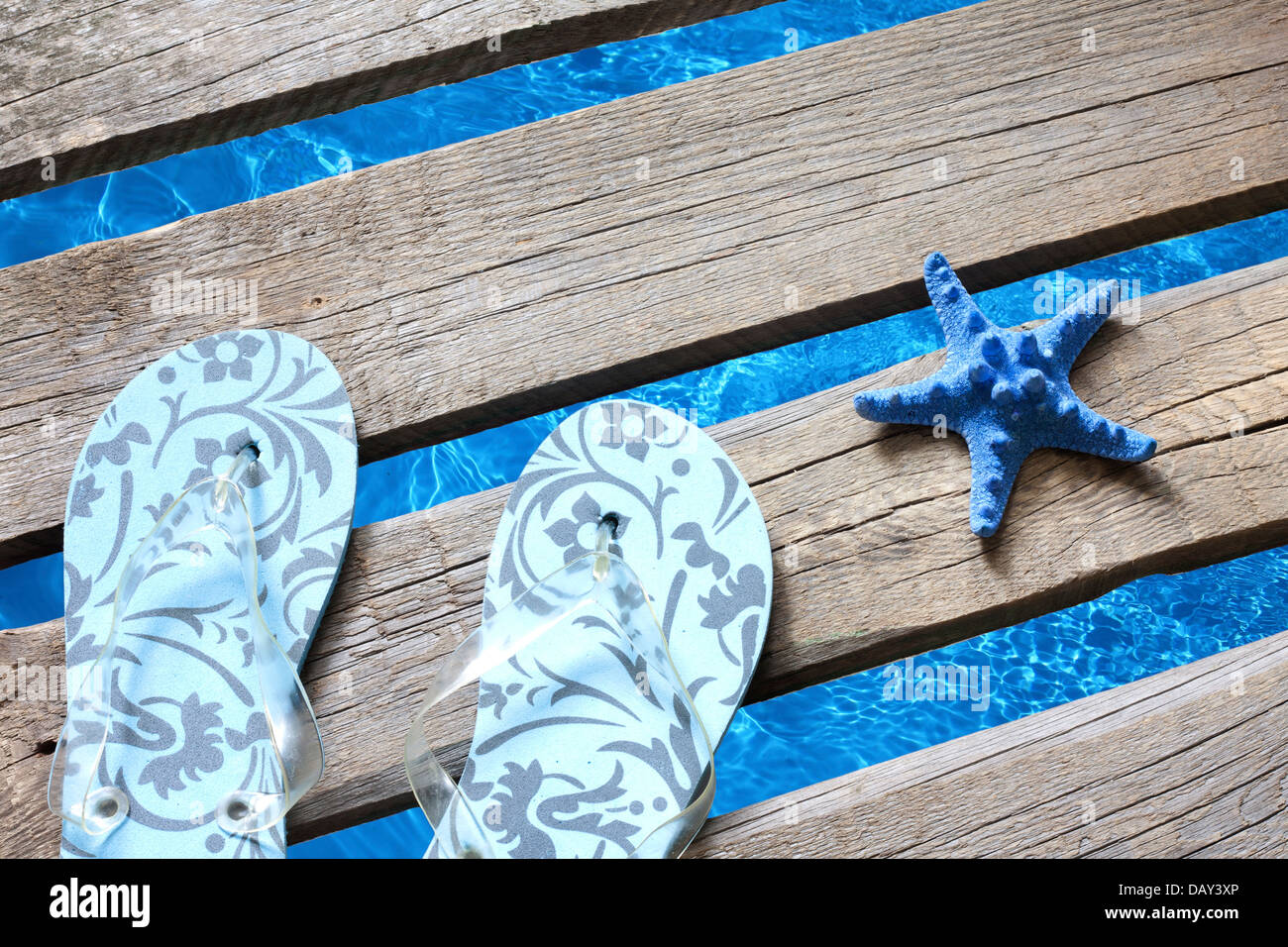 Beachwear on the pier at sea holiday vacation background concept Stock Photo