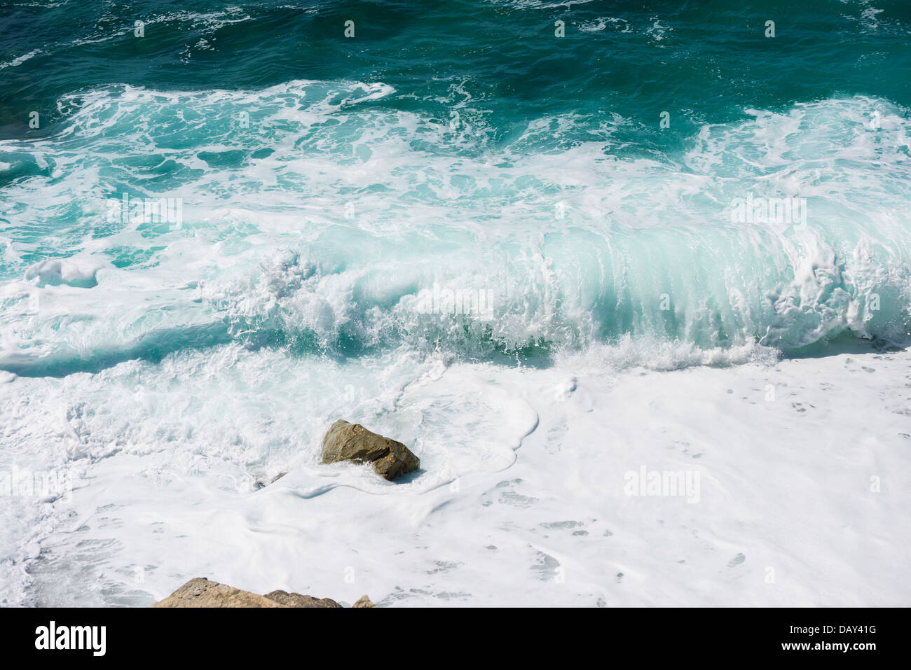 Breaking Wave, the Power of Nature. From the cliffs near Fistral Beach, Newquay, Cornwall. Stock Photo