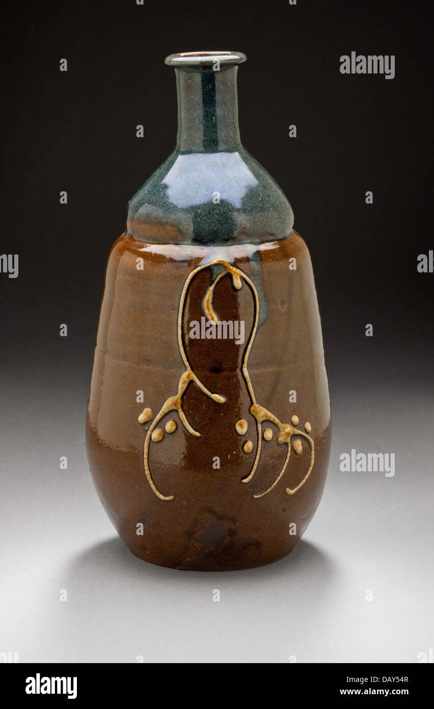 Gourd shaped sake bottle tokkuri with willow design hires stock