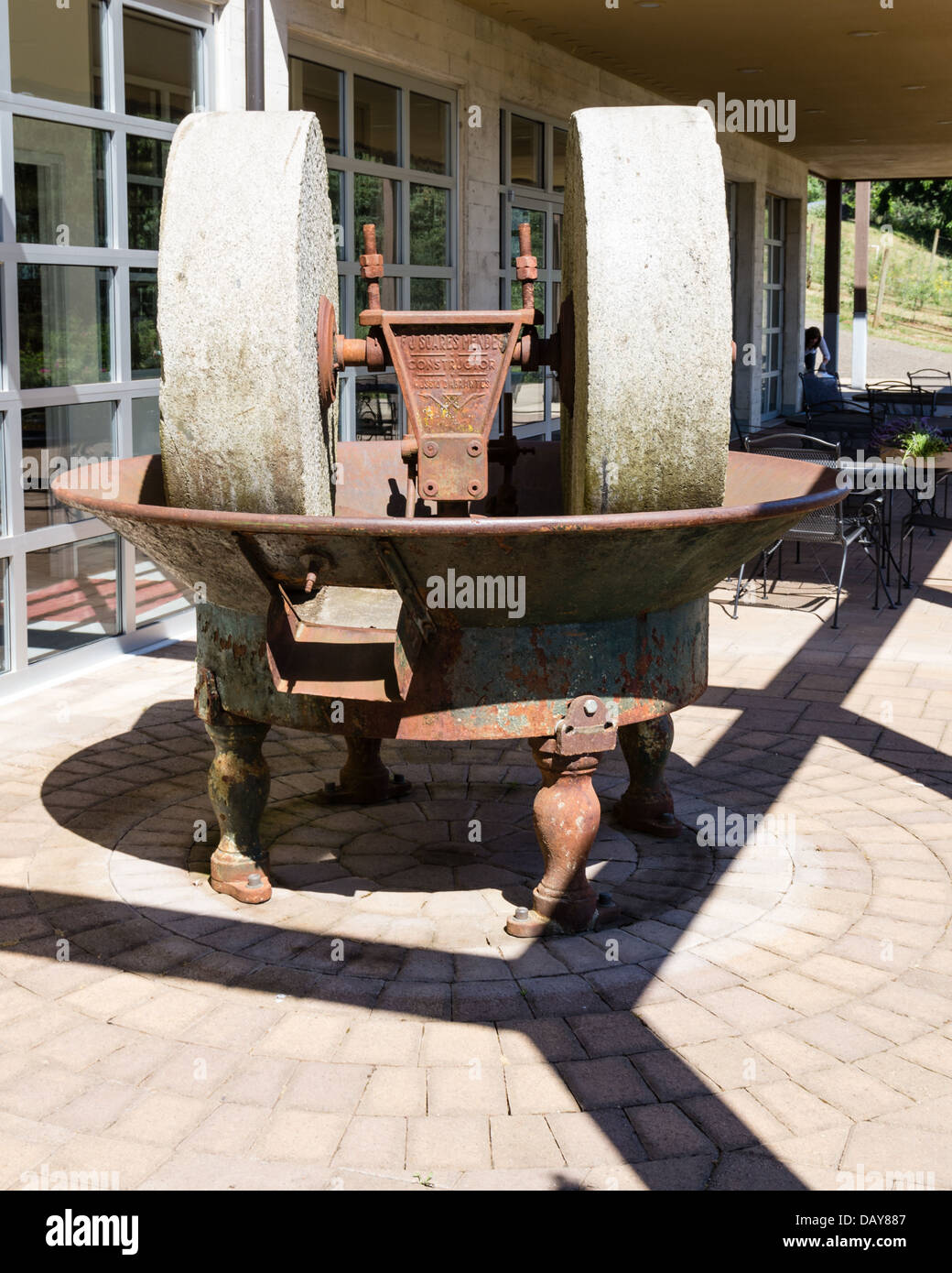 Antique olive press used to make olive oil. Dayton, Oregon, USA Stock