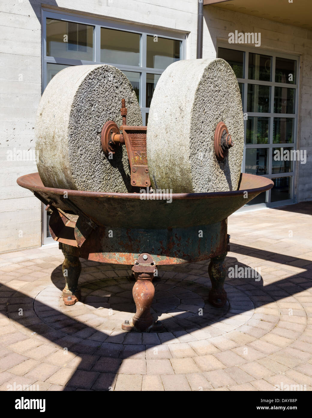 Antique olive press used to make olive oil. Dayton, Oregon, USA Stock