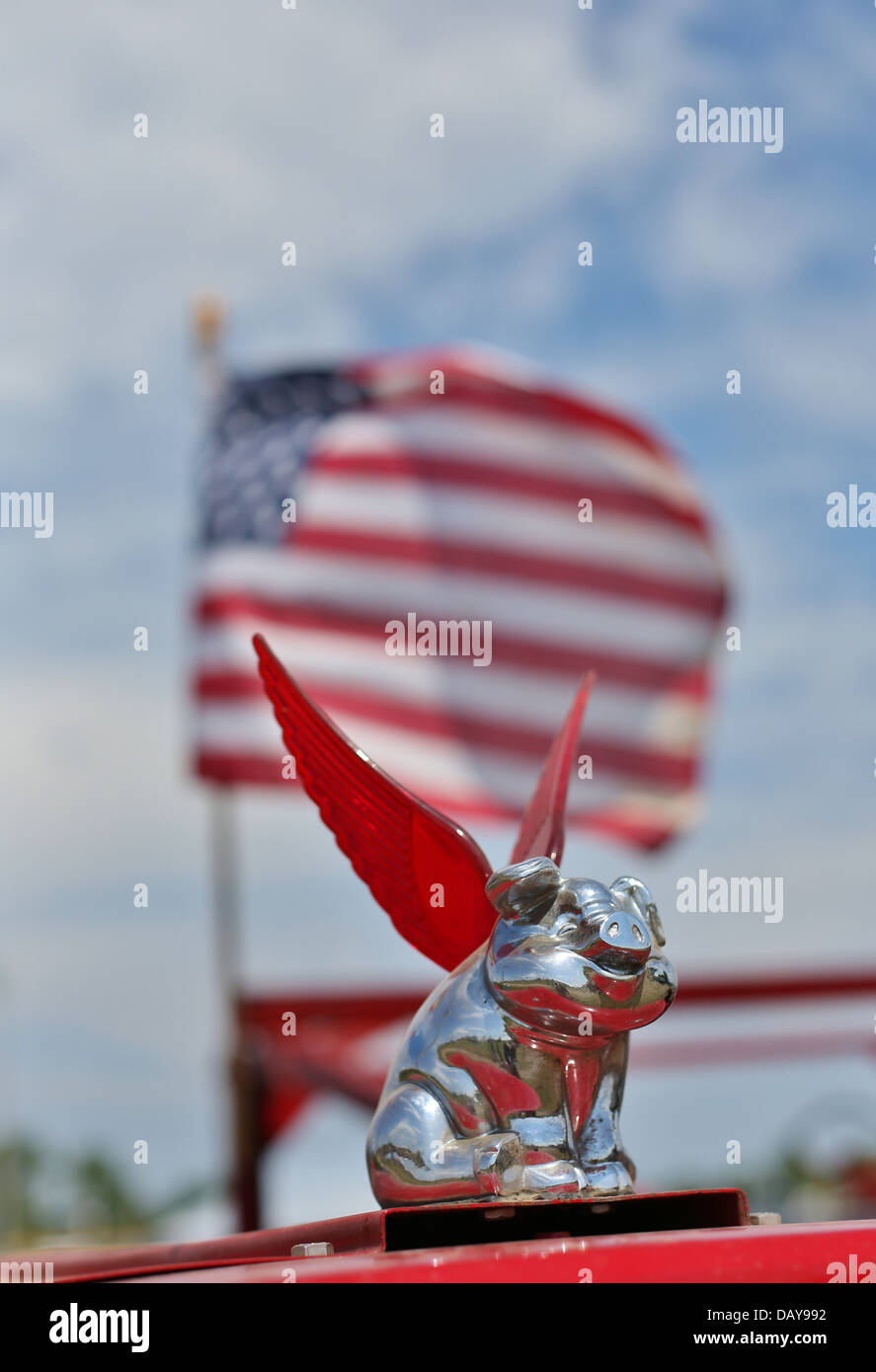 A pig with wings hood ornament. Stock Photo
