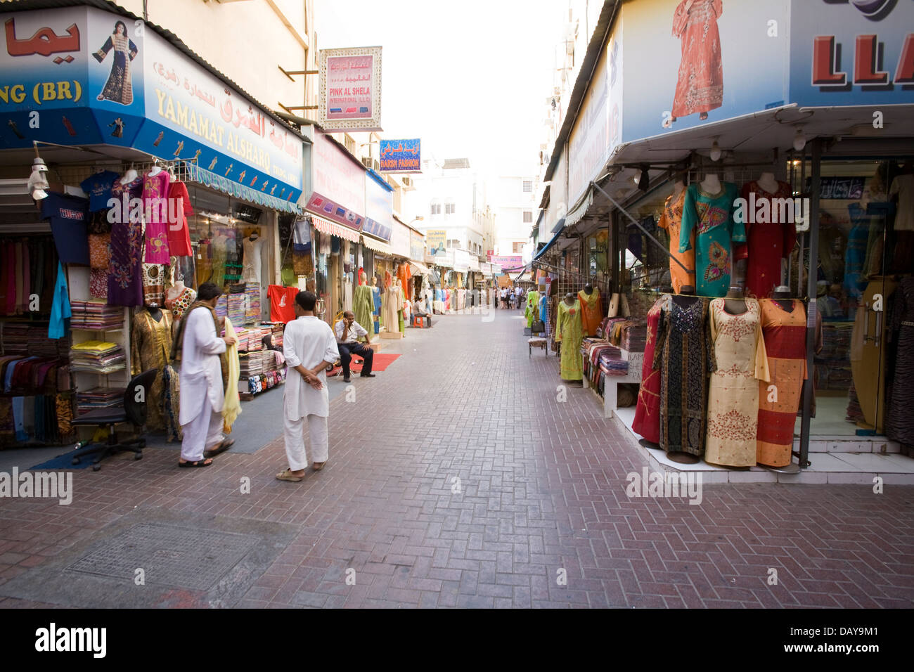 Shops and vendor stalls along the narrow, labyrinthine streets of the old Deira neighborhood of Dubai, United Arab Emirates Stock Photo
