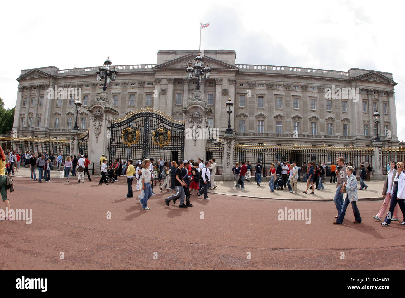 Crowds of people walk outside Buckingham Palace, London, England Stock Photo