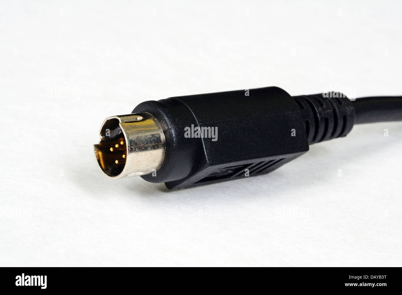 Seven pin mini-din male connector against a white background Stock Photo -  Alamy