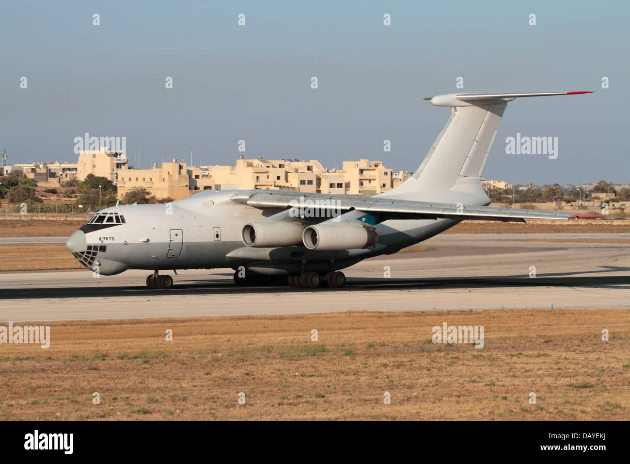 Ilyushin Il-76TD cargo jet aircraft taking off from Malta. Worldwide air transport and freight delivery. Stock Photo