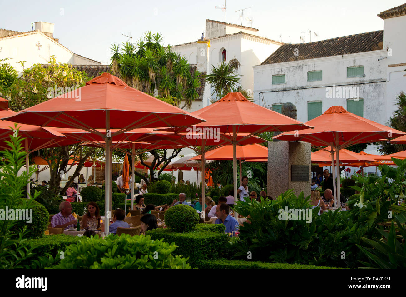 Tourists dining at Orange square in Marbella. Costa del Sol, Spain
