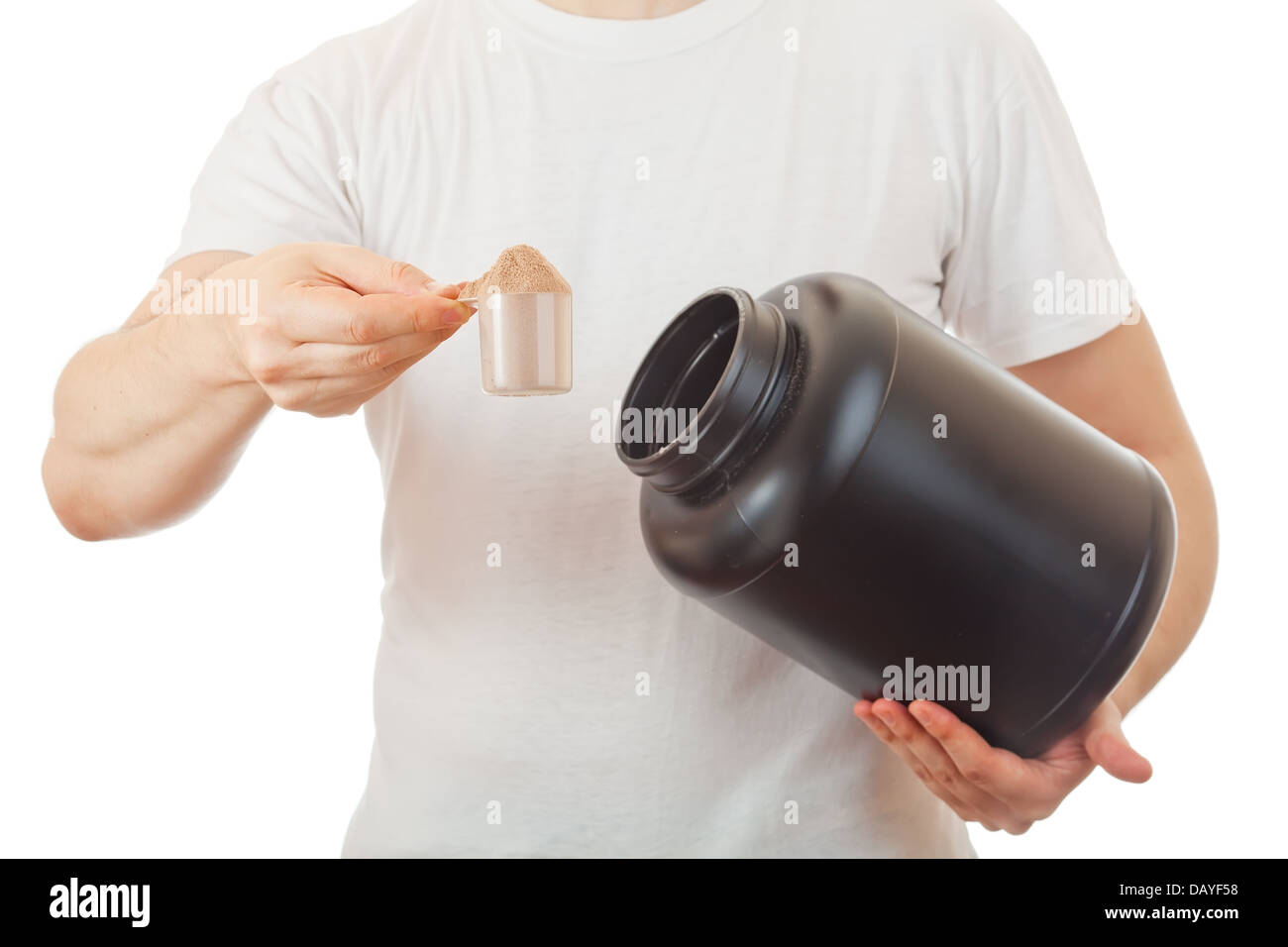 Man's holding scoop of chocolate whey protein shake Stock Photo Alamy