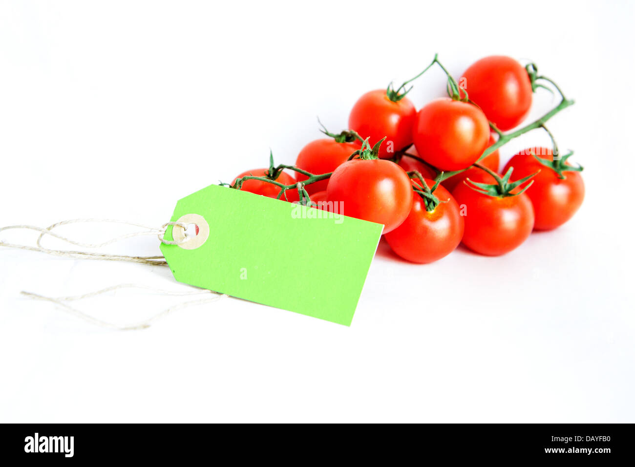 Cherry tomatoes isolated on white Stock Photo