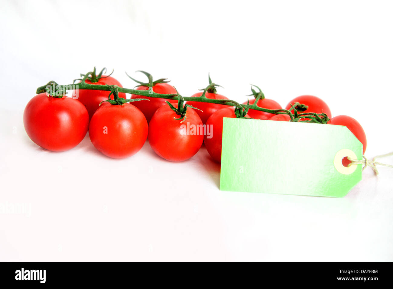 Cherry tomatoes isolated on white Stock Photo