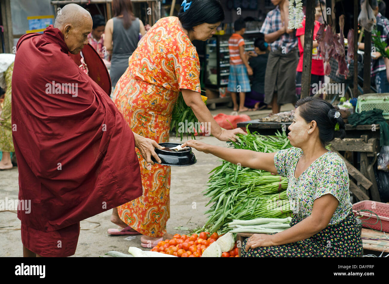Monk  at the market,Yangon,Burma Stock Photo