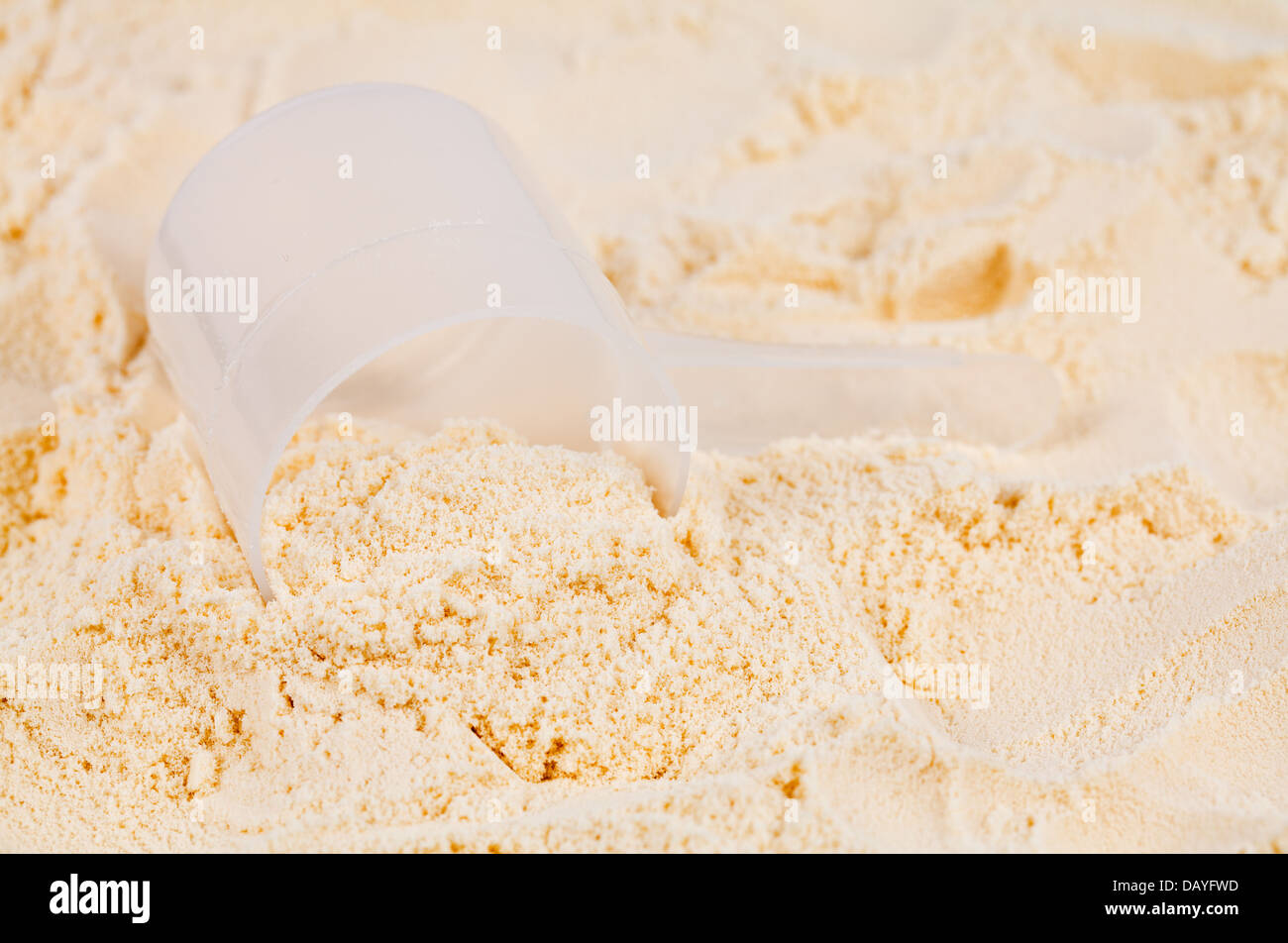 A scoop of vanilla whey isolate protein Stock Photo Alamy
