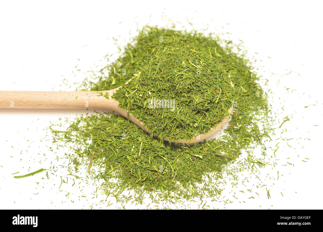 dry dill in a wooden spoon isolated on white background Stock Photo Alamy