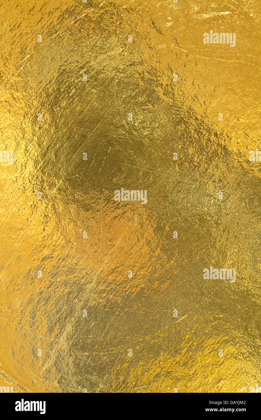 Sheet of gold foil with surface scratches and dark spots Stock Photo Alamy