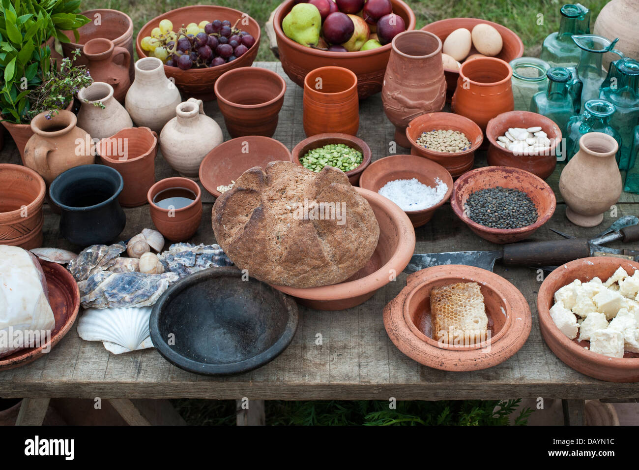 Table of wine and food in a roman camp at a historical re enactment display. Stock Photo