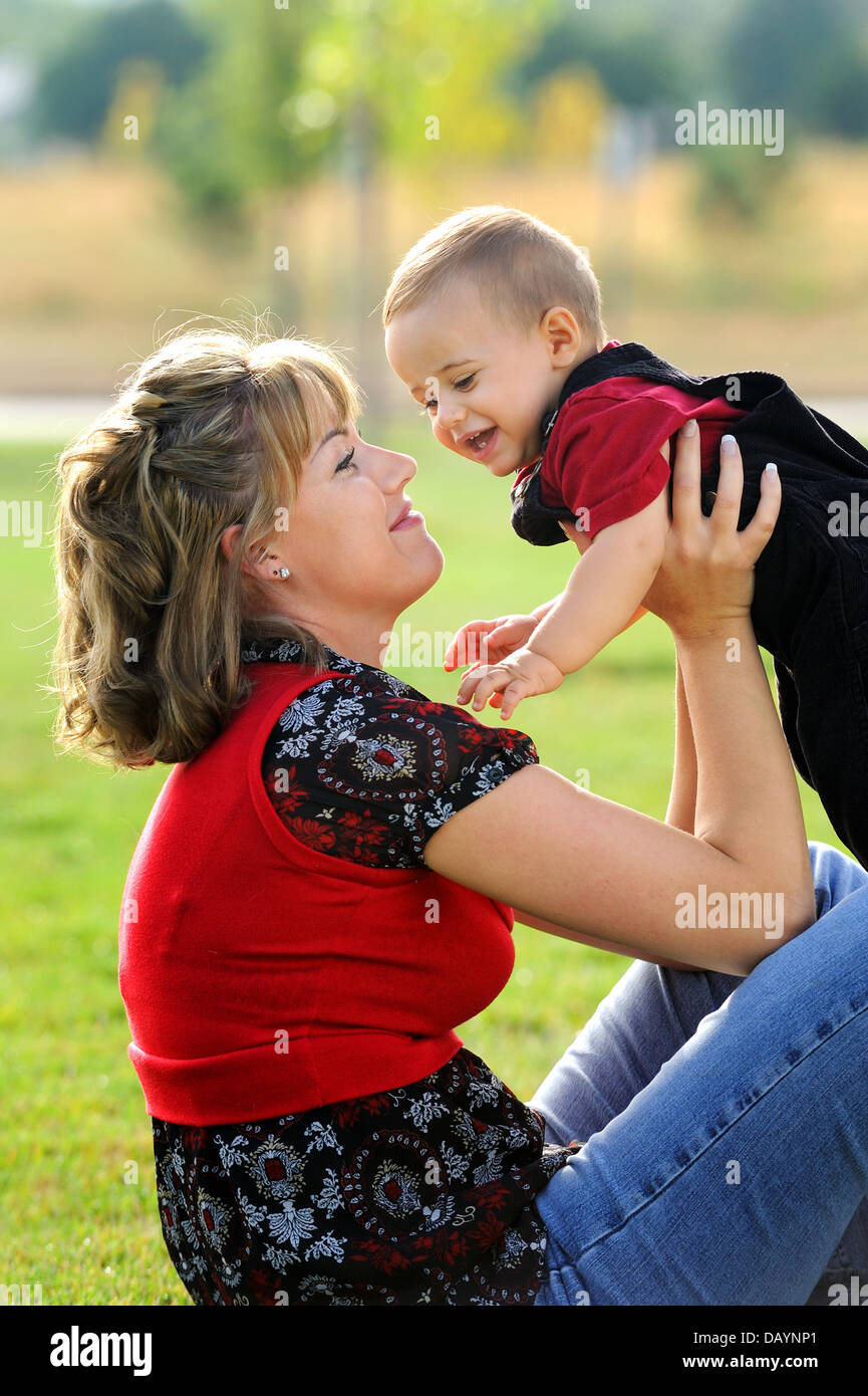 Happy mother playing with child Stock Photo