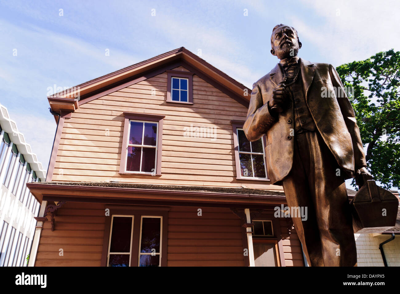 Helmcken House and statue of Dr. John Sebastian Helmcken. Victoria, British Columbia, Canada. Stock Photo