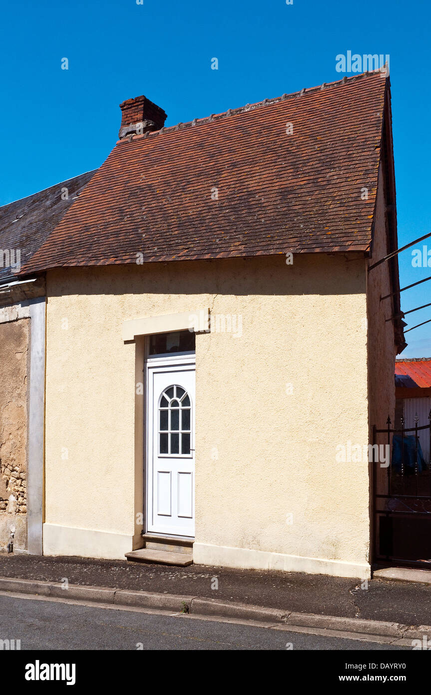 Small terraced house with no front windows - France. Stock Photo