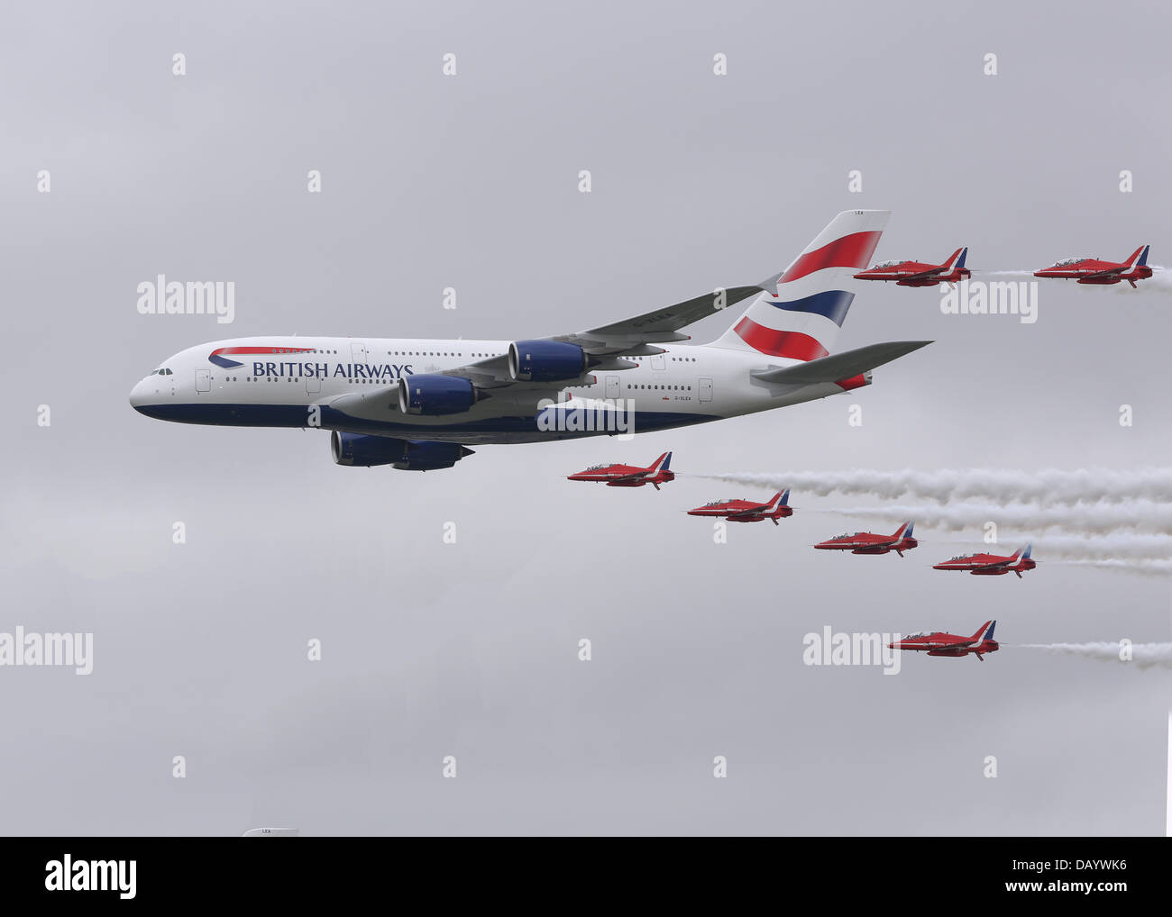Fairford, UK. 20th July, 2013. The Airbus 380 is about to enter service with British Airways.  To celebrate this their first Airbus 380 performed a flypast in formation with the Red Arrows at the 2013 Royal International Air Tattoo Stock Photo
