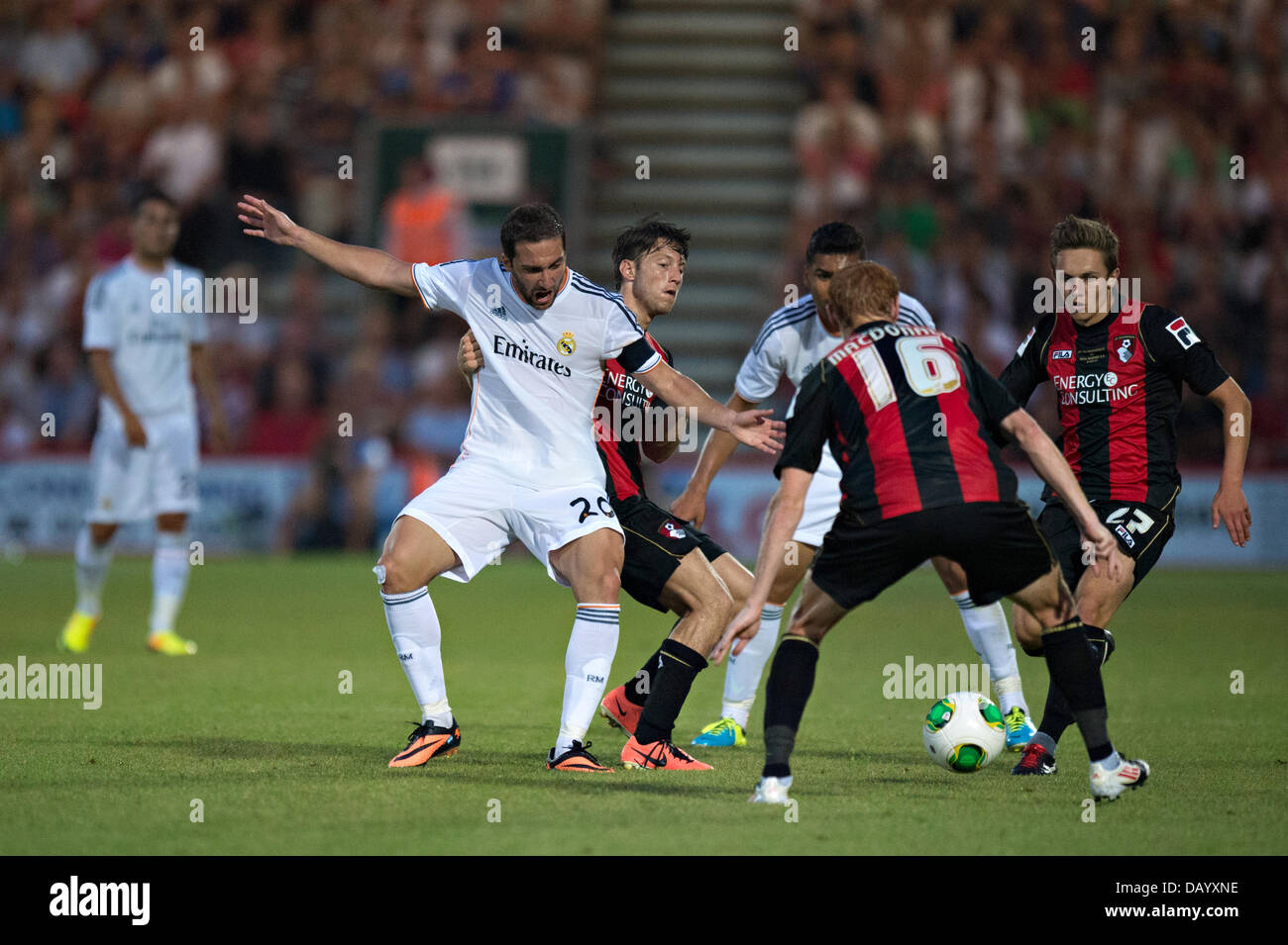 Bournemouth, UK. 21st July, 2013. Bournemouth AFC vs Real Madrid - Sunday 21st July 2013. Bournemouth, UK. Scorer of the 4th goal Gonzalo Higuain is pulled back and off the ball during a run in the second half. Credit:  MeonStock/Alamy Live News Stock Photo
