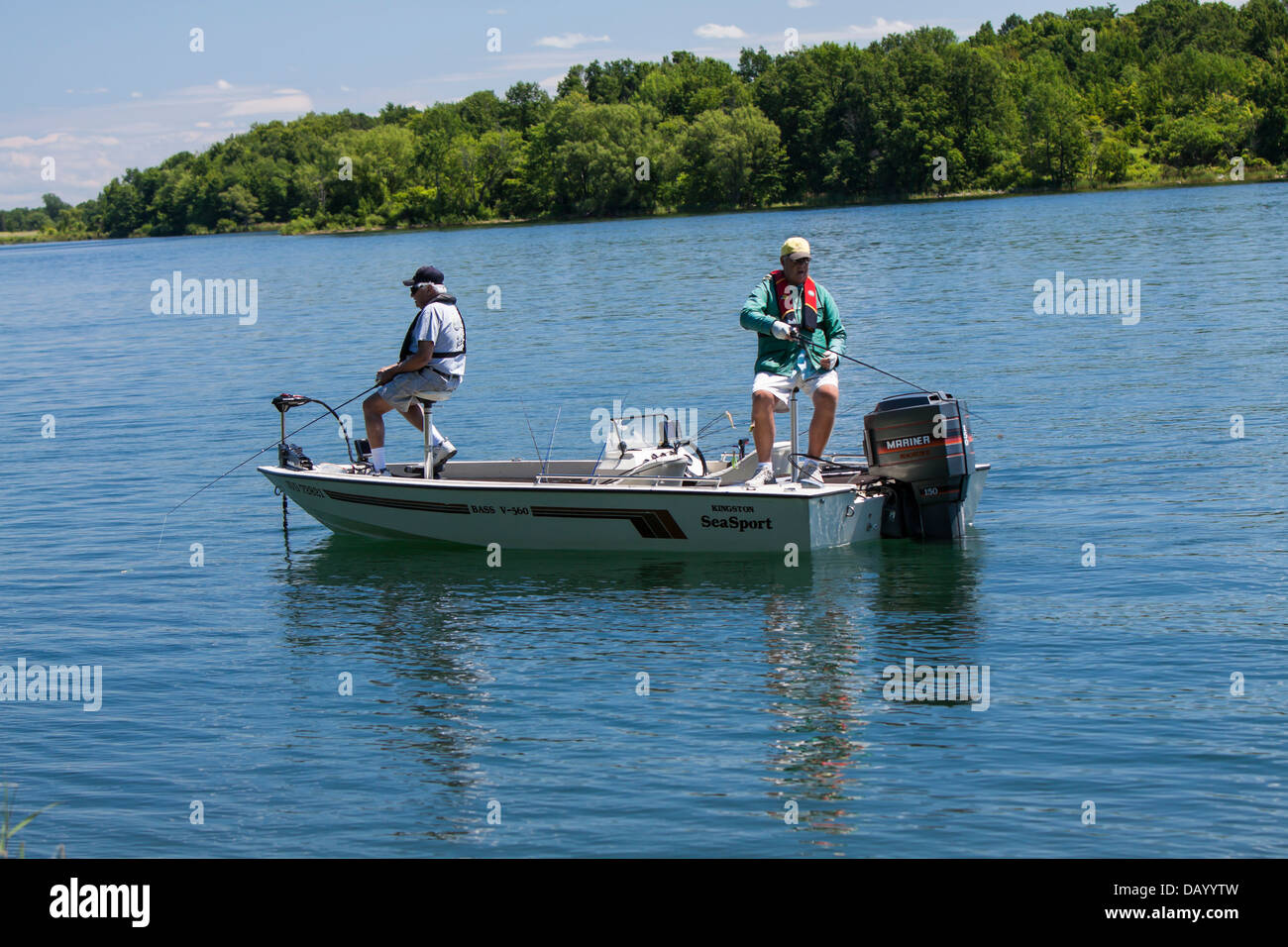Fishermen fishing from a boat. Stock Photo