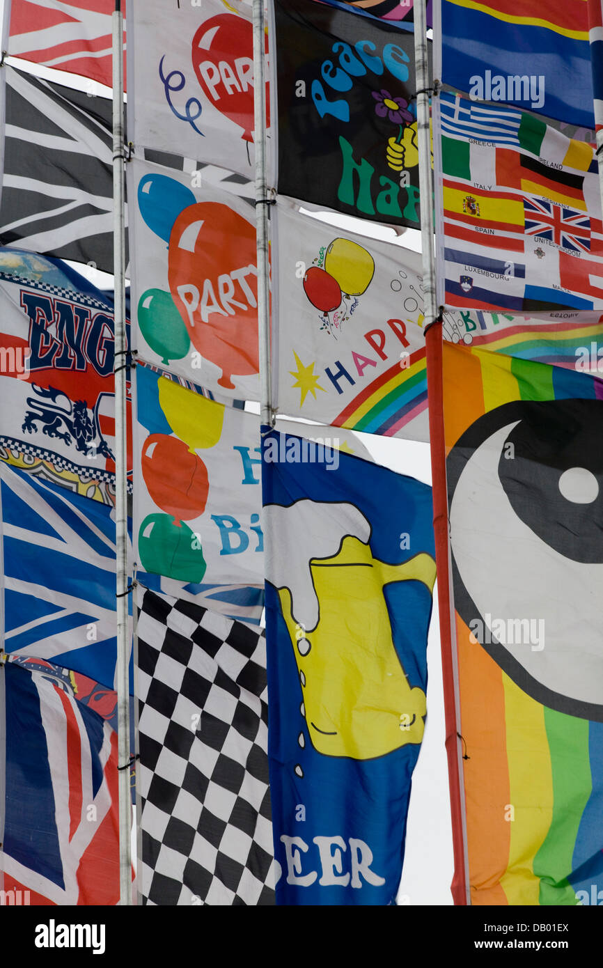 Assortment of Colorful Flags flying in the breeze Stock Photo - Alamy
